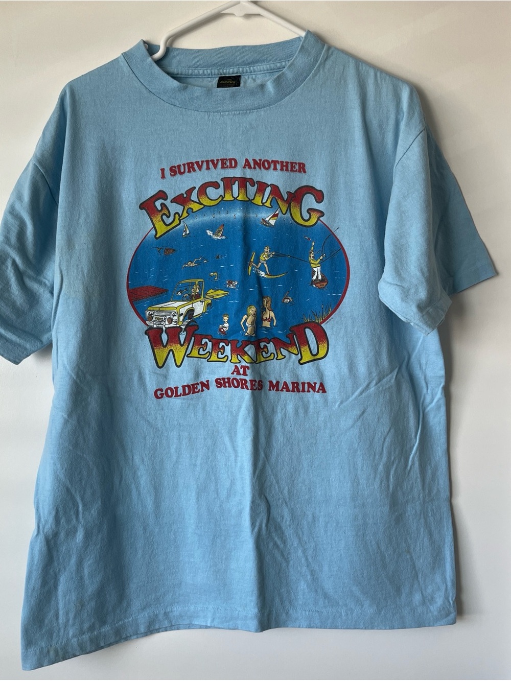 Vintage “I Survived Another Exciting Weekend” Light Blue Graphic Tee